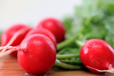 Close-up of cherries on table