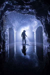 Reflection of woman in water