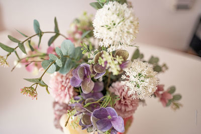 Close-up of flower vase on table