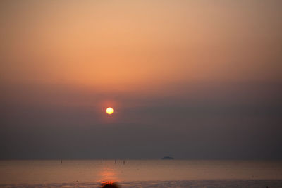 Scenic view of sea at sunset