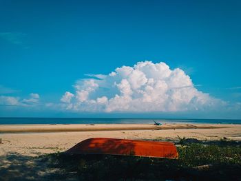 Scenic view of sea against blue sky