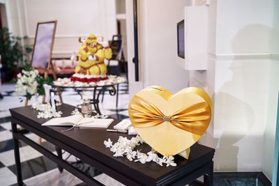 Flower vase on table at home