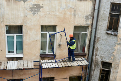 Man working at construction site in building