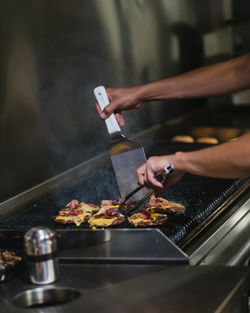 Midsection of person preparing food