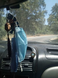 Reflection of car on side-view mirror