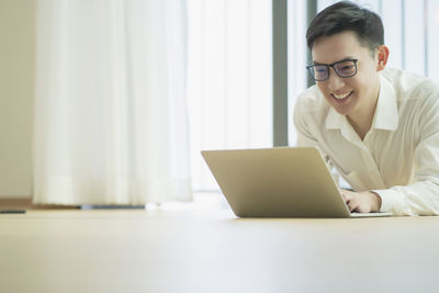 Young man using mobile phone