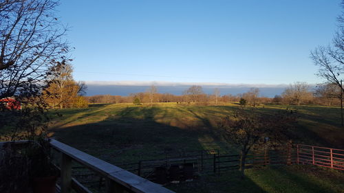 Scenic view of calm sea against clear sky