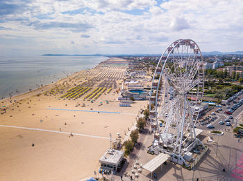 High angle view of ferris wheel in city