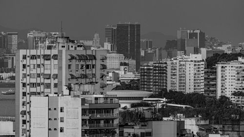 Buildings in city against sky