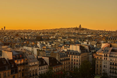 High angle view of townscape against sky during sunset