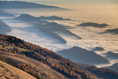 Scenic view of landscape against sky during sunset