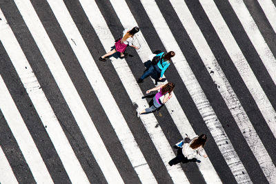 High angle view of women walking on road