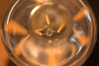 Close-up of illuminated light bulb