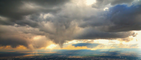 Panoramic view of storm clouds over landscape