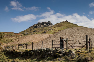 Built structure on land against sky