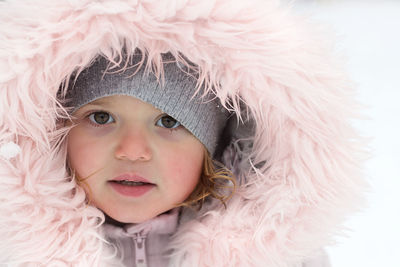 Portrait of cute girl in snow