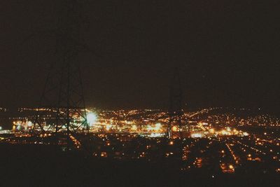 Illuminated cityscape at night