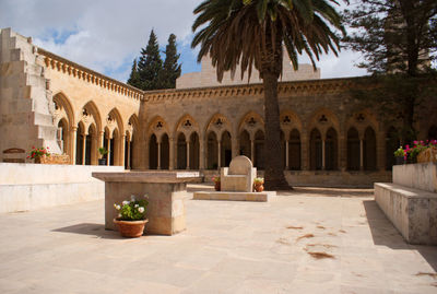 Exterior of historic building against sky