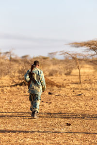 Man walking on field