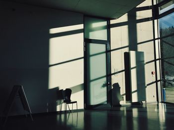 People sitting on glass window