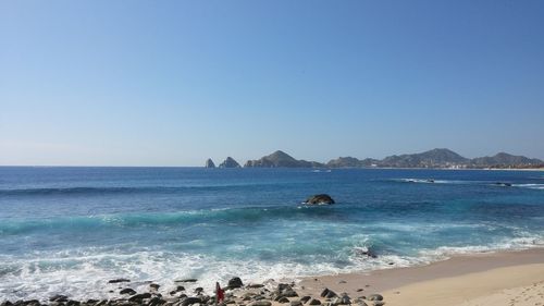 Scenic view of sea against clear sky