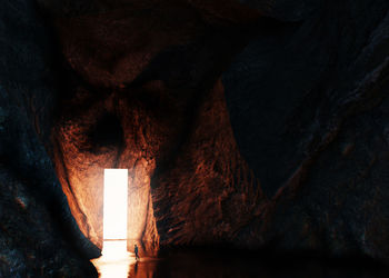 Low angle view of illuminated tunnel