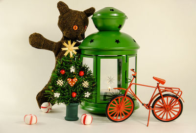 Close-up of christmas decorations on white background