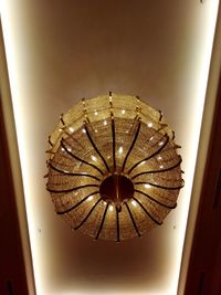 Low angle view of illuminated chandelier