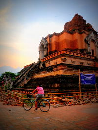 Bicycle parked in front of building