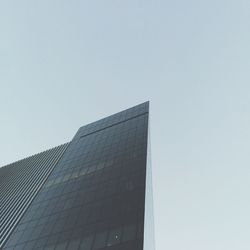 Low angle view of buildings against clear sky