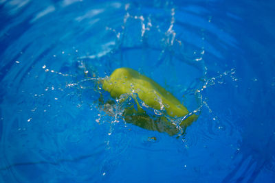 High angle view of water splashing in swimming pool