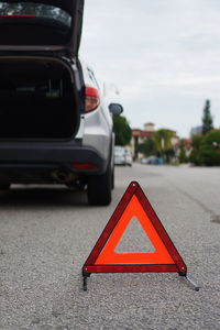 Road sign on street in city