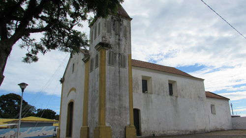 Low angle view of historic building against sky