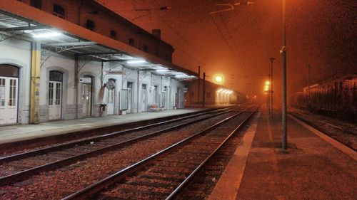 Railroad station platform at night