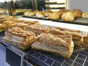 Focus on shelves with bread in a supermarket