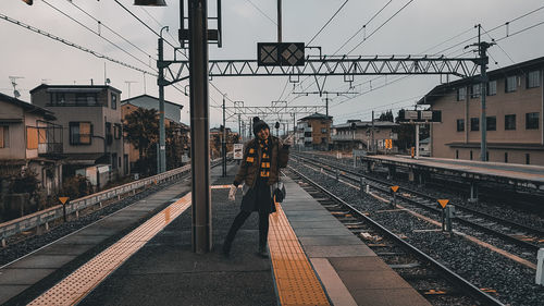 Railroad station platform against sky