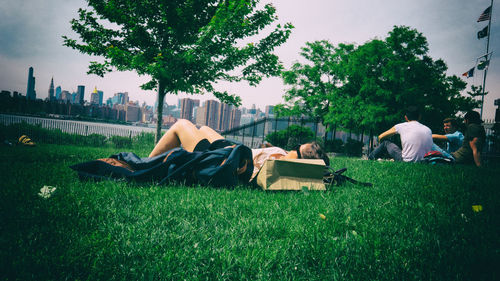 People relaxing in park