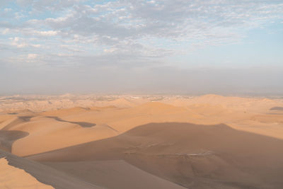 Scenic view of desert against sky