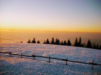 Scenic view of winter landscape during sunset