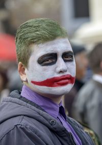 Close-up portrait of man with mask