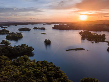 Aerial panorama drone picture of islands in the lumot lake caliraya, cavinti, philippines at sunset