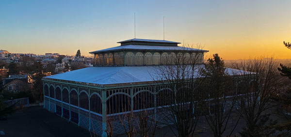 Building against sky during sunset