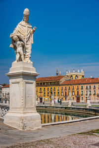 Statue in padua against clear sky