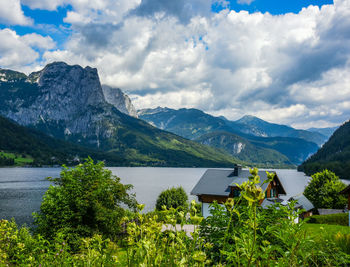 Scenic view of lake and mountains against sky in beautiful upper austria