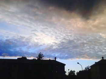 High section of building against cloudy sky