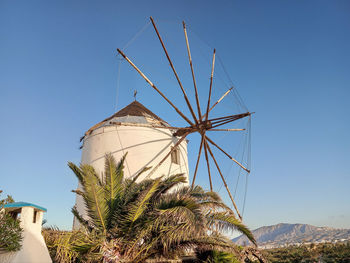 Low angle view of windmill against clear sky