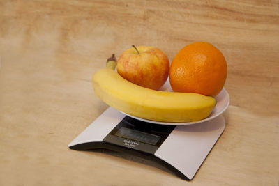 Close-up of orange fruits on table