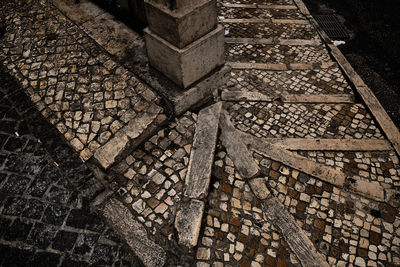 High angle view of old cobblestone street