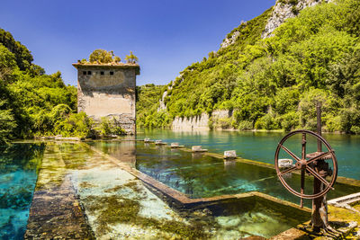 Scenic view of lake against blue sky