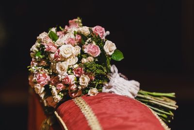 Close-up of rose bouquet against black background